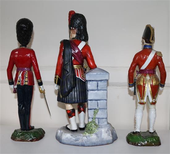 Three soldier figures